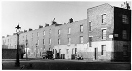 Photo:View of the northside of Ashmill Street, numbers 27-7 and the corner with Salisbury Street 1955